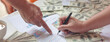 © aFotostock - Banner Close up hands giving money bribe payment. Hands holding dollar bill bribery financial economy business people. Banner people corrupt illegal pay graft. Corruption bribe with copy space