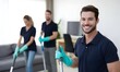 © simba kim - clean office, professional team of window and floor cleaning service workers in dark navy polo shirts and pastel teal gloves vacuuming white floors