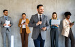 © NDABCREATIVITY - Professional in office environment, highlighting teamwork, collaboration, leadership, and innovation