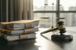 © dimedrol68 - A judge's gavel, scales and a stack of papers.