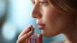 © Руслан Галиуллин - woman enjoys the scents of her favorite perfume