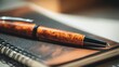 © Sergey - close up of a polished wooden pen resting on a notebook, shallow depth of field, clean workstation with soft daylight, elegant professional mood