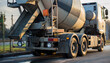 © King - Cement mixer truck driving swiftly to the construction site, ensuring timely delivery for infrastructure projects, a symbol of progress and development