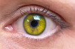 © nata777_7 - girl's yellow eye close up