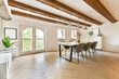 © ADDICTIVE STOCK - Modern dining room with wooden beams and bright decor