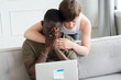 © neirfy - Young couple watching laptop together