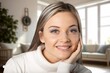© BillionPhotos.com - Head shot woman sits alone at home