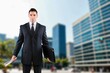 © BillionPhotos.com - Mature, thinking businessman posing in big city street