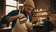 © gankevstock - Skilled barista making delicious latte art coffee in a trendy cafe