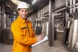 © BillionPhotos.com - Confident engineer with safety helmet in factory