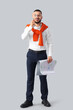 © Pixel-Shot - Young businessman with magnifier and map on light background. Search concept