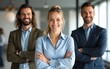 © Henry - Happy business team with arms crossed at the office. High quality
