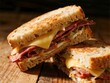 © Errada - Reuben Sandwich A grilled sandwich composed of corned beef, Swiss cheese, sauerkraut, and Russian dressing on rye bread.