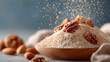 ©  VladaToday - Splash of chocolate powder and nuts falling into wooden bowl in slow motion. Concept of dessert ingredients, gourmet baking, and premium confectionery advertising..