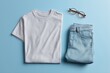 © Andrii Zastrozhnov - Casual outfit: white t-shirt, light blue jeans, glasses on blue background