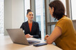 © ReeldealHD images - Business manager training new employee in an office