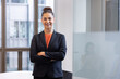 © ReeldealHD images - Portrait of a young employee in a corporate office