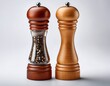 © Lilimanatasa - Close-up of two wooden salt and pepper grinders isolated on a white background