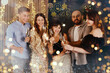 © New Africa - Happy New Year 2026 greeting card, bokeh lights. Friends celebrating with sparklers and wine glasses indoors