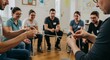 © O - Man and woman participate in a team activity using a rope during a workshop. Collaborative teamwork for problem solving and communication.