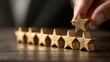 © SaroStock - Achieving financial goals with gold stars atop increasing coin stacks represents excellence and outstanding performance in business on a dark background