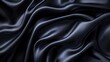 © 怡如 柯 - dark silky satin fabric with flowing folds and glossy highlights evoking elegance and mystery