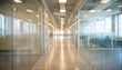 © hao - Blurred office hallway with glass walls and neutral colors creates a sense of space. Professional photos for backgrounds for text, banners, posters, and web displays. High quality. High quality