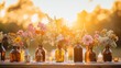 © Nazia - Romantic diy flower bottle decor glowing at sunset for outdoor events