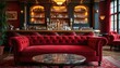 © Maryna - Plush red velvet sofa in a classic bar. Elegant furniture, ambient lighting, and a well-stocked bar create a luxurious atmosphere for relaxation and socializing.