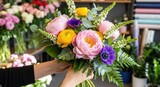 Beautiful floral bouquet with peonies, anemones, and greenery