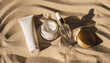 © Athiphat - Moisturizer cream jar, serum dropper bottle, cleanser tube, and gold lid arranged on sand, highlighting sensitive skin skincare set in natural, sunlit setting for beauty care