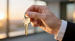 © Zucide - Business Hand Holding Key on Warm Sunset Light with Realistic Skin Details for Corporate Success, Leadership, Real Estate and Opportunity Visuals
