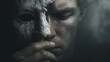 © Luiri Art - Man holding a cracked white mask covering half his face with visible tension in expression, gothic dark background with fog and dramatic lighting, concept of dual identity and inner conflict