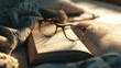 © Thiago - An open book with eyeglasses sitting on a bed, illuminated by soft sunlight. A cozy scene for reading