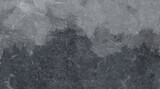 Dark grey stone surface with rough textured patterns creating a natural abstract rock background.