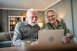© Migma_Agency - Senior couple online shopping together using laptop and credit card