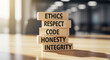 © Henhen - Ethical business practices and core values concept with wooden blocks. This image represents the importance of ethics, respect, and integrity in the workplace
