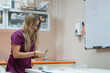 © Gonzalo Infiesta - Veterinarian preparing medicine in clinic laboratory