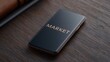 © FocusFusion - Exploring Digital Trends With a Bold 'MARKET' on a Sleek Smartphone Display in Daylight