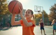 © jia - Adaptive Sports for Kids, Young Girl Enjoying Basketball in a Sunny Outdoor Sports Environment. High quality