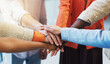 © peopleimages.com - People, diversity or meeting with hands together for unity, trust or mission in office. Group, employees or multiracial team with pile, stack or huddle for community inclusion, solidarity or cohesion