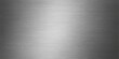 © PIXEL - Brushed metallic texture pattern on a gray steel surface or silver aluminum plate
