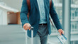 © FlexOn/peopleimages.com - Person, hands or travel with suitcase in airport for business journey, work trip or commute. Ticket, employee or traveler with luggage or international boarding pass for departure or job opportunity
