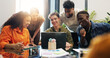 © DavidsPrime/peopleimages.com - Laptop, happy people or meeting in creative agency to review proposal, planning project or strategy. Collaboration, brand awareness or marketing team brainstorming with tech, campaign ideas or flare