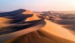 © Sintia - Expansive desert landscape with rolling sand dunes sculpted by wind, bathed in warm, soft light.