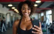 © ning - Fitness, woman and phone blog for live stream exercise at gym on platform or app. Influencer, training or health vlog with black person or coach talking to social media or virtual audience with light
