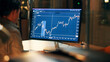 © FlexOn/peopleimages.com - Computer, screen and man with graphs at night, data analysis or stock market research with working late. Info, financial chart and trading analyst with tech for trader dashboard review or deadline