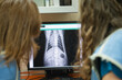 © Gonzalo Infiesta - Veterinarians analyzing pet x-ray for diagnosis