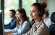 © Henry - Call center worker accompanied by her team. High quality