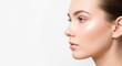 © D-point - Profile view of young woman with perfect skin, natural makeup. Skincare, cosmetics, beauty or cosmetology concept with copy space.